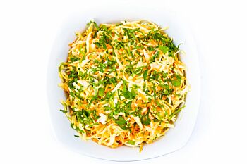 Platter of  Homemade Coleslaw with Grated Vegan Cheese